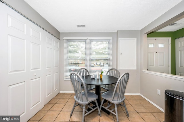 view of tiled dining room