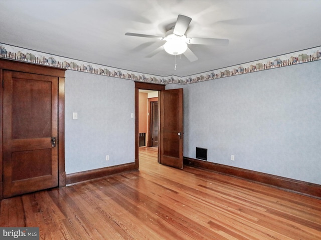 unfurnished bedroom with wood-type flooring