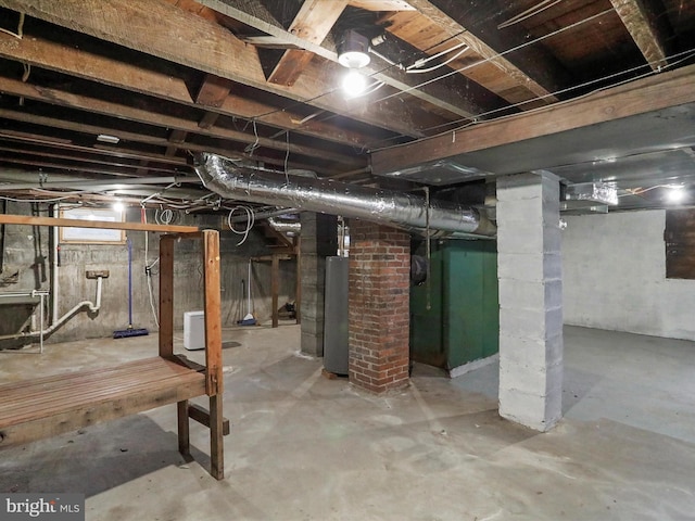 basement featuring gas water heater