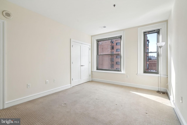 view of carpeted spare room