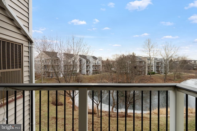 balcony featuring a water view