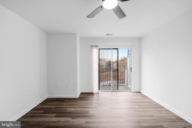 unfurnished room featuring hardwood / wood-style flooring and ceiling fan