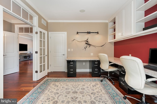 home office with crown molding, dark hardwood / wood-style flooring, and french doors