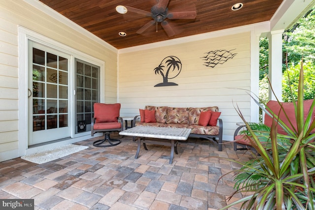 view of patio / terrace with an outdoor living space and ceiling fan