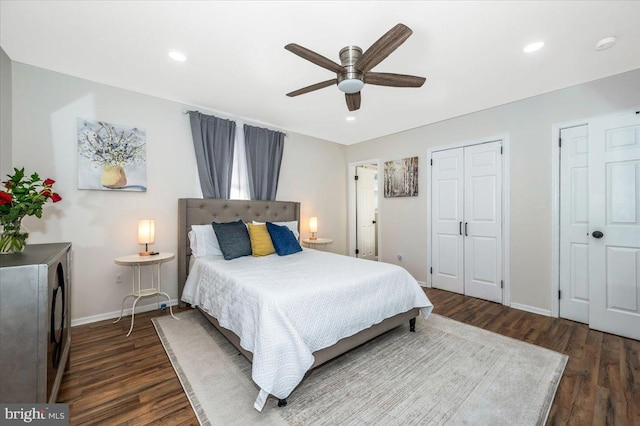 bedroom featuring dark wood-type flooring, recessed lighting, and baseboards