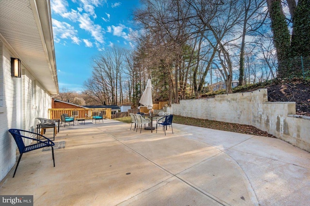 view of patio / terrace featuring a fenced backyard and outdoor dining area