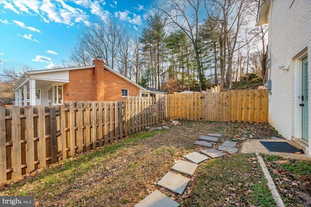 view of yard featuring a fenced backyard