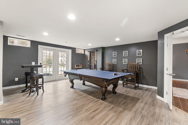 playroom featuring billiards, light hardwood / wood-style flooring, and french doors