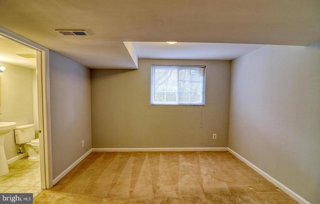 basement with light carpet