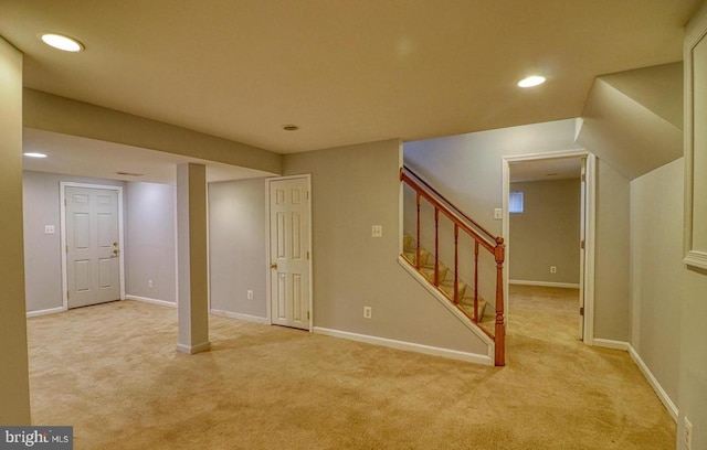 basement with light colored carpet