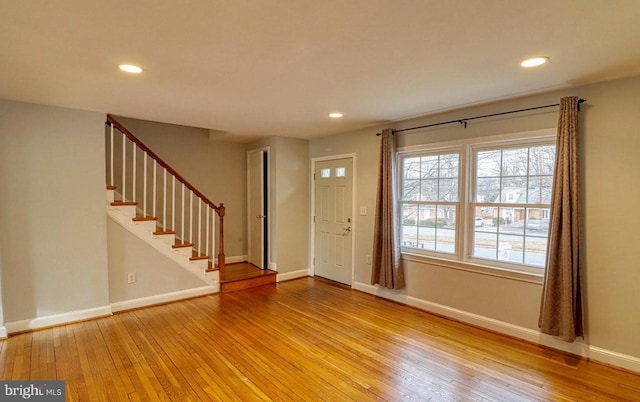 entrance foyer featuring hardwood / wood-style floors