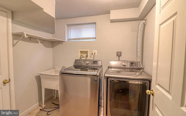 laundry room featuring washing machine and dryer