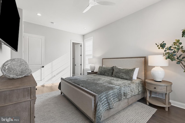 bedroom featuring ceiling fan and wood-type flooring