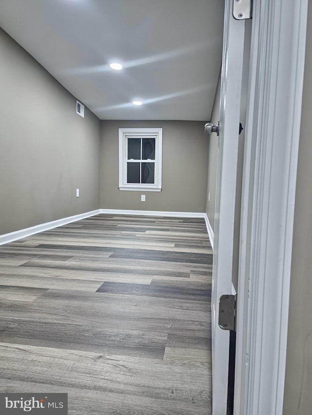 spare room featuring light wood-type flooring