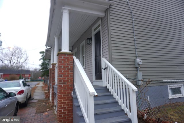 doorway to property with covered porch