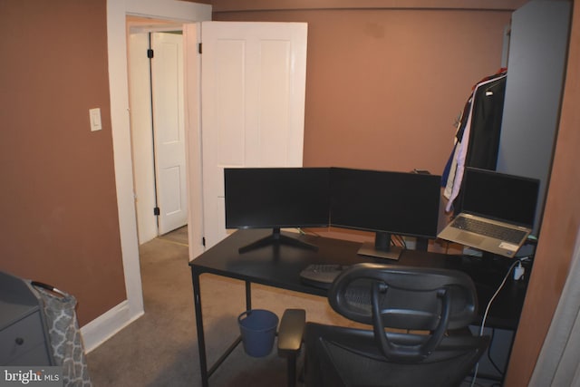 office area featuring carpet floors and baseboards