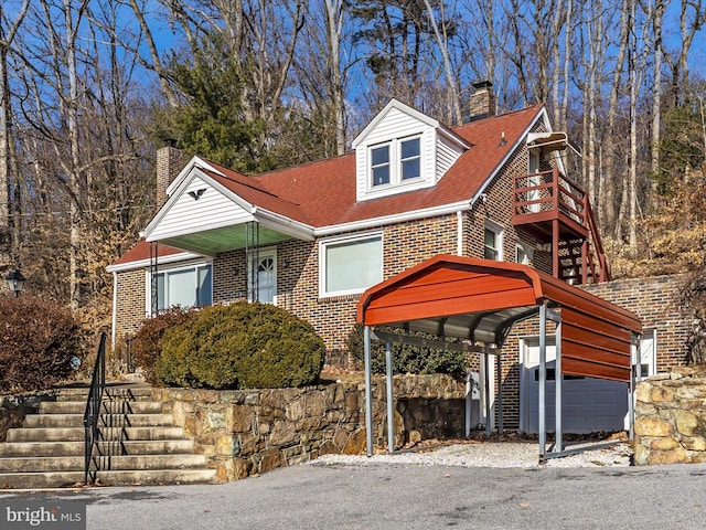 view of front of house with a carport