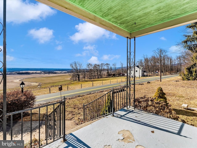 view of patio / terrace with a rural view