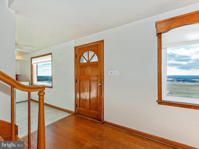 foyer with light wood-type flooring