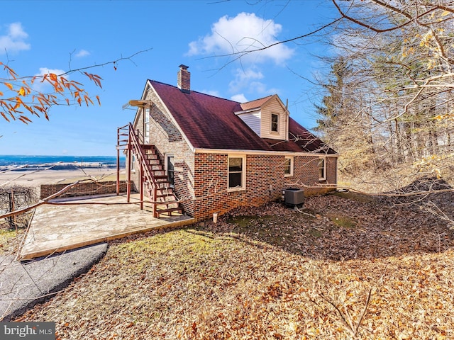 view of home's exterior with a patio area