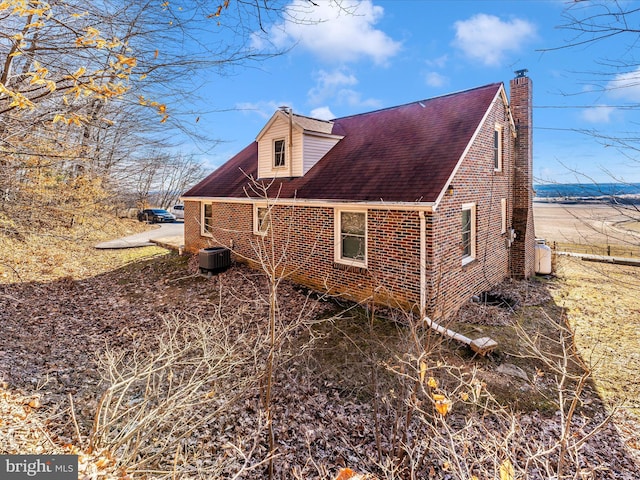 view of home's exterior featuring cooling unit