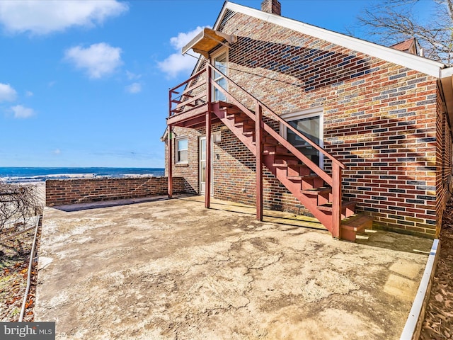 view of patio / terrace with a water view