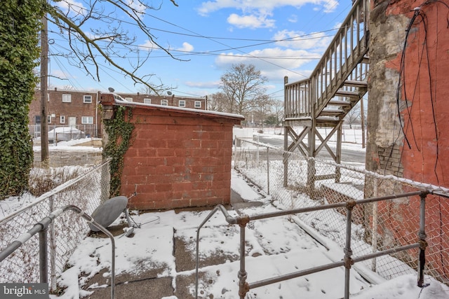 view of snow covered patio