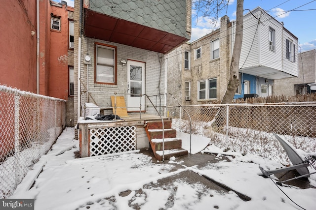 view of snow covered patio
