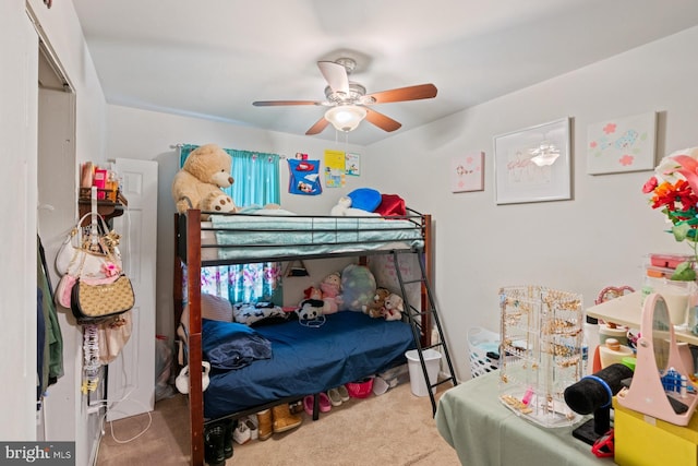 bedroom featuring ceiling fan and carpet flooring