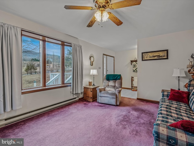 living room featuring baseboard heating, ceiling fan, and carpet flooring