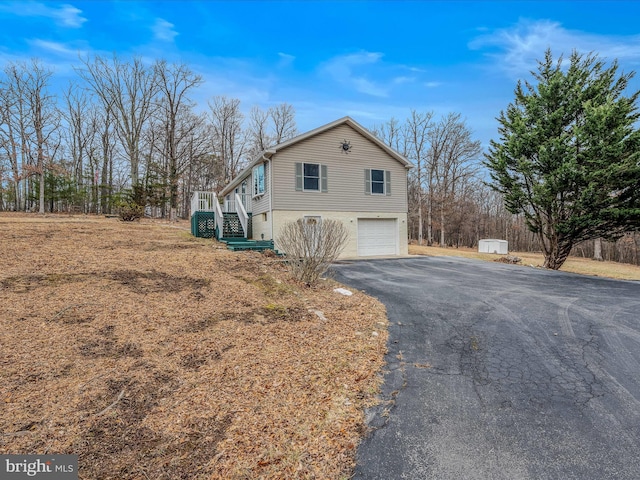 view of property exterior featuring a garage