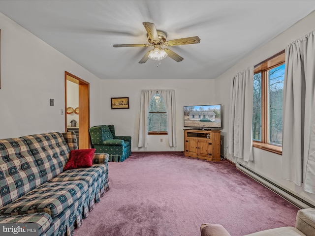 living room with ceiling fan, carpet, and baseboard heating