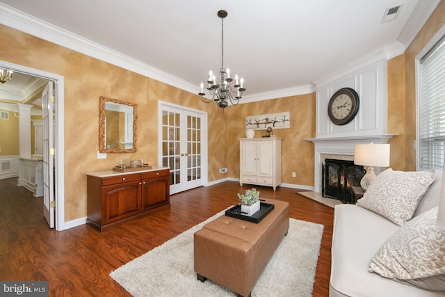 living area featuring dark wood-style floors, french doors, a chandelier, and visible vents