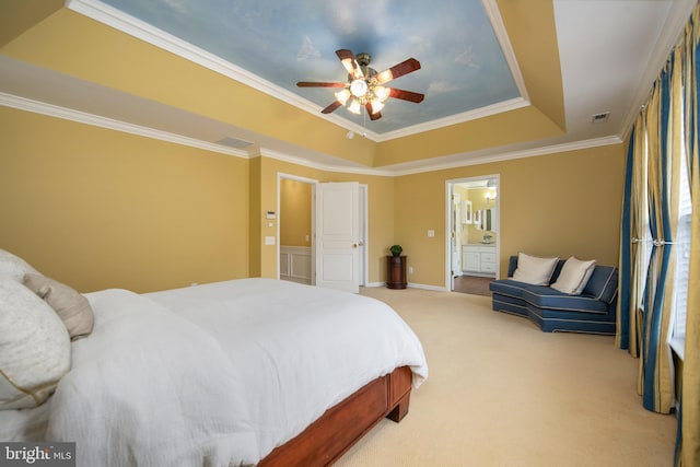 bedroom with ornamental molding, a raised ceiling, light carpet, and visible vents