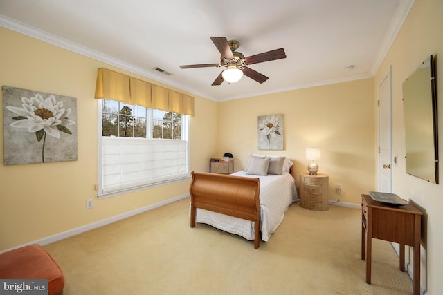 bedroom featuring visible vents, baseboards, light colored carpet, and crown molding