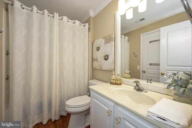 bathroom featuring toilet, visible vents, ornamental molding, and wood finished floors