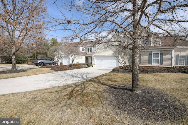 view of front facade with a garage, concrete driveway, a front lawn, and brick siding