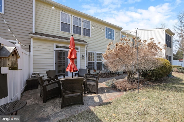 rear view of house with a patio