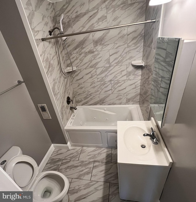 bathroom featuring visible vents, toilet, marble finish floor, a combined bath / shower with jetted tub, and vanity