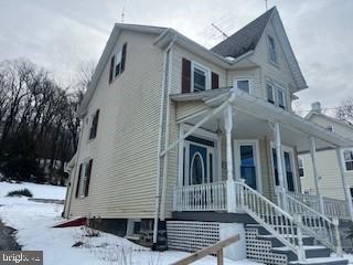 view of snow covered property