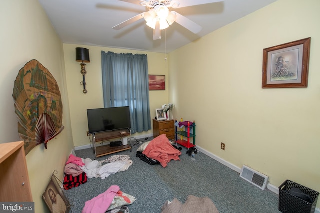 recreation room featuring ceiling fan and carpet floors