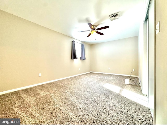 empty room with carpet and ceiling fan