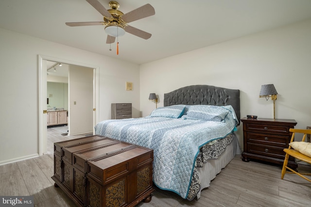 bedroom featuring ceiling fan and light hardwood / wood-style floors