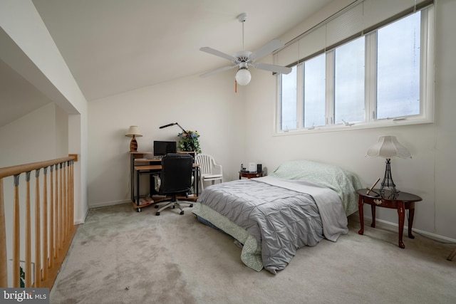 carpeted bedroom with lofted ceiling and ceiling fan