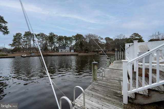 view of dock with a water view