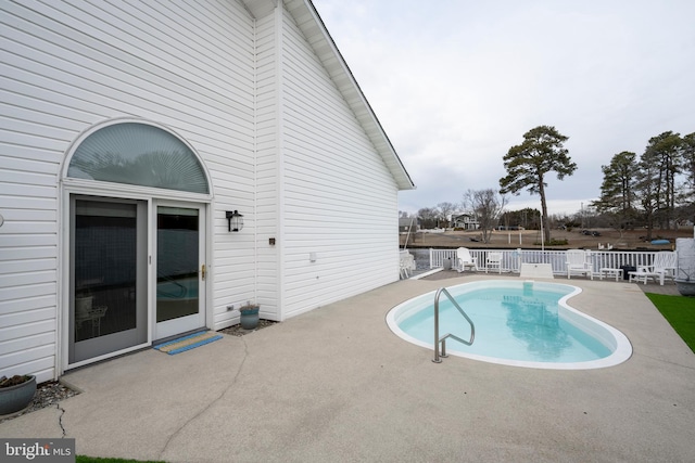 view of pool with a patio