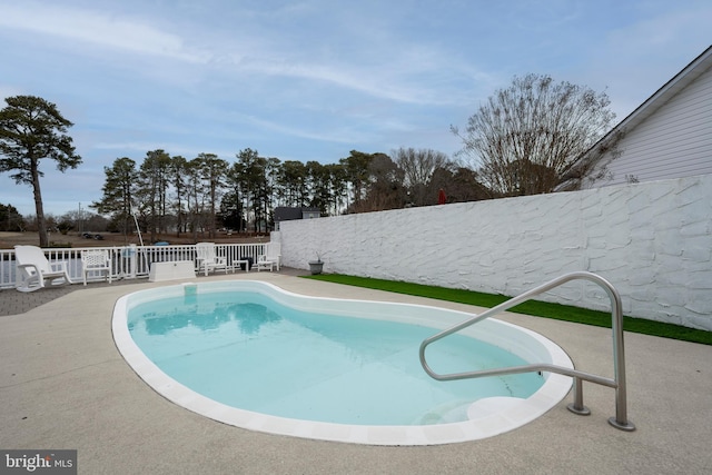 view of pool with a patio area