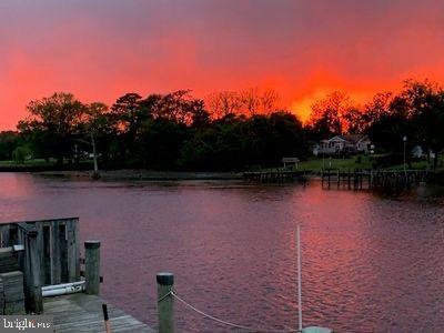 property view of water with a boat dock