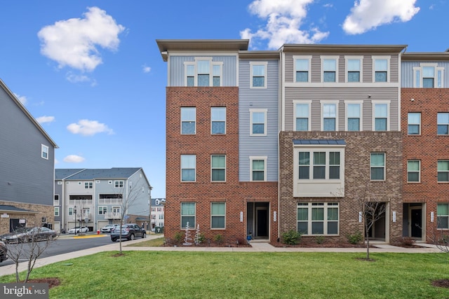 exterior space featuring a front lawn