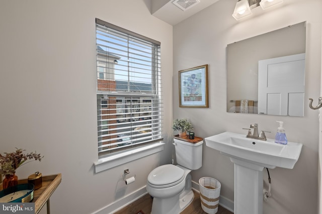 bathroom featuring toilet